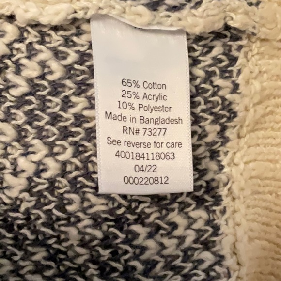 NWT.  SIze L cream over black knit sweater with scattered black knit flowers. - Picture 4 of 4